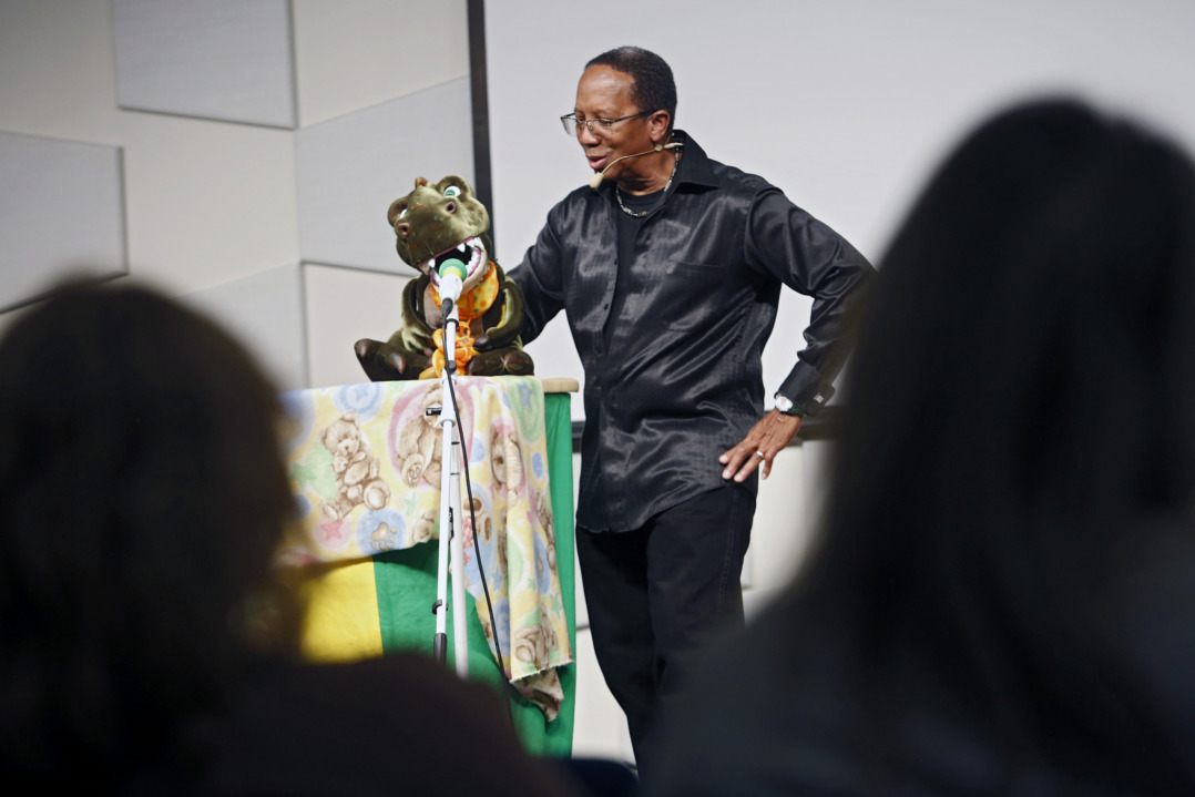 A puppeteer puts on a show in the performance space at the Children's Tower