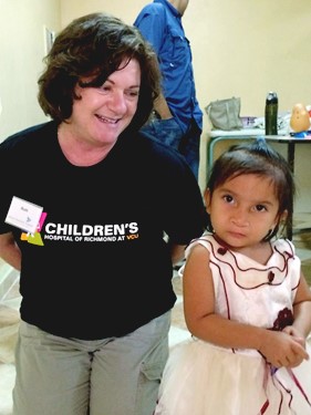 Ruth and patient, World Pediatric Project 2014 Mission to Honduras