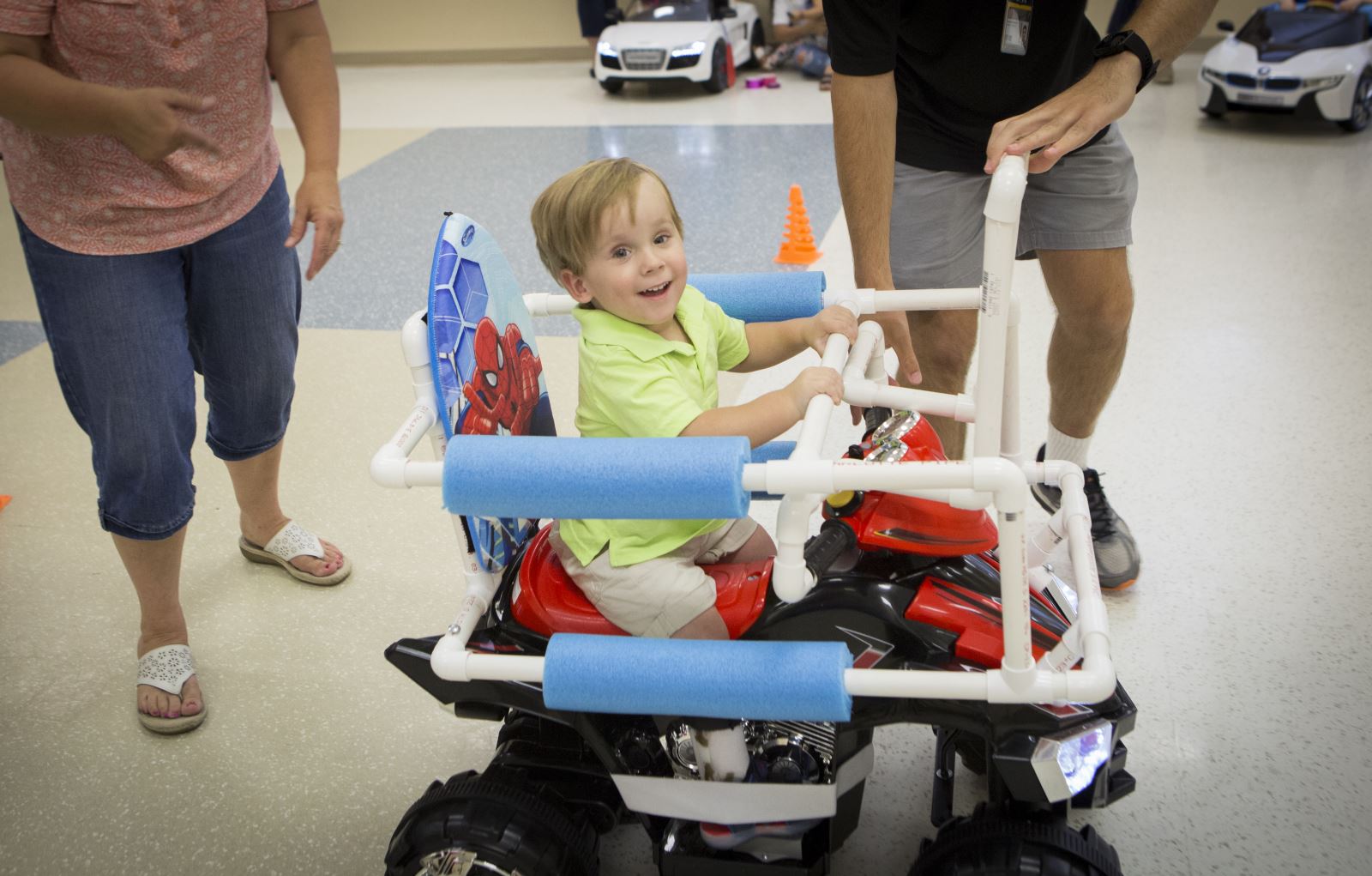 Toddler in assistive cart