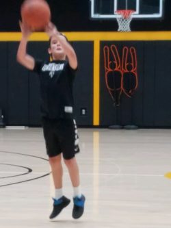 Tyler shooting basketball