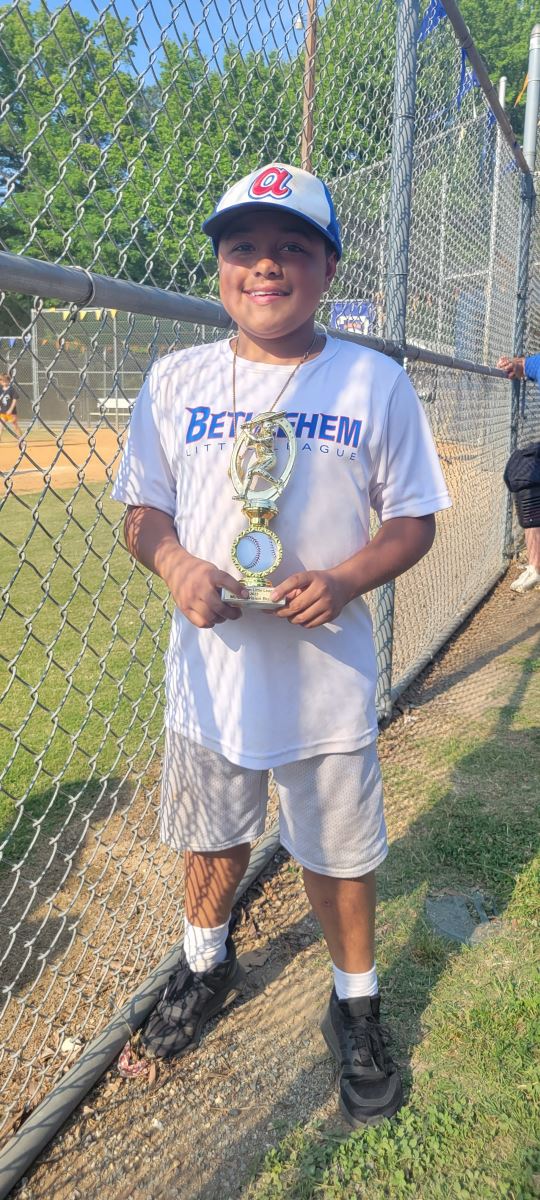 CHoR patient Damarius with his baseball trophy