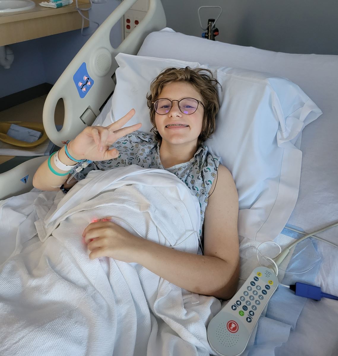CHoR trauma patient Hannah Foster smiling in her hospital bed