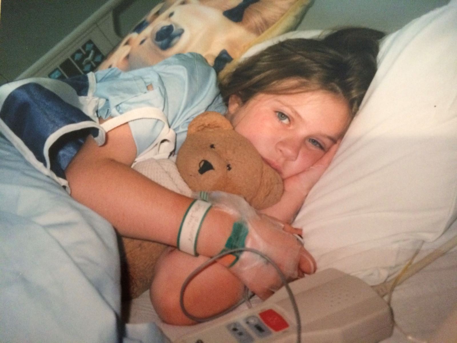 CHoR patient Jenna Jacoby in her hospital bed at 8 years old