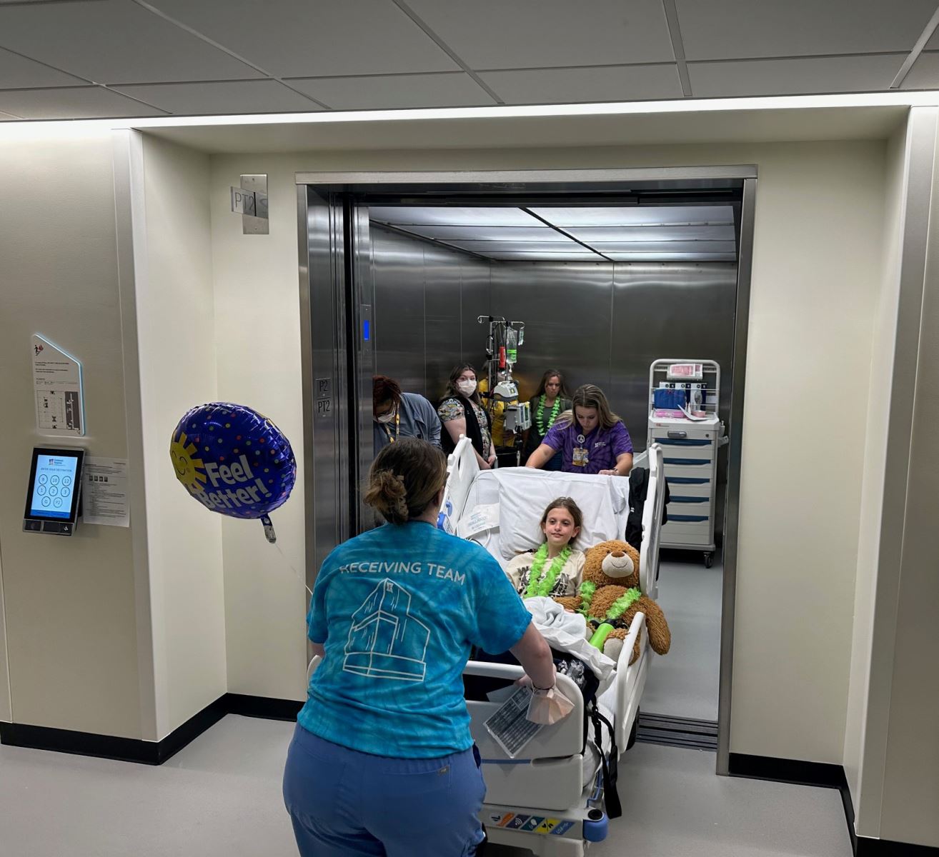 CHoR patient Cheyenne enters elevator during move to Children's Tower