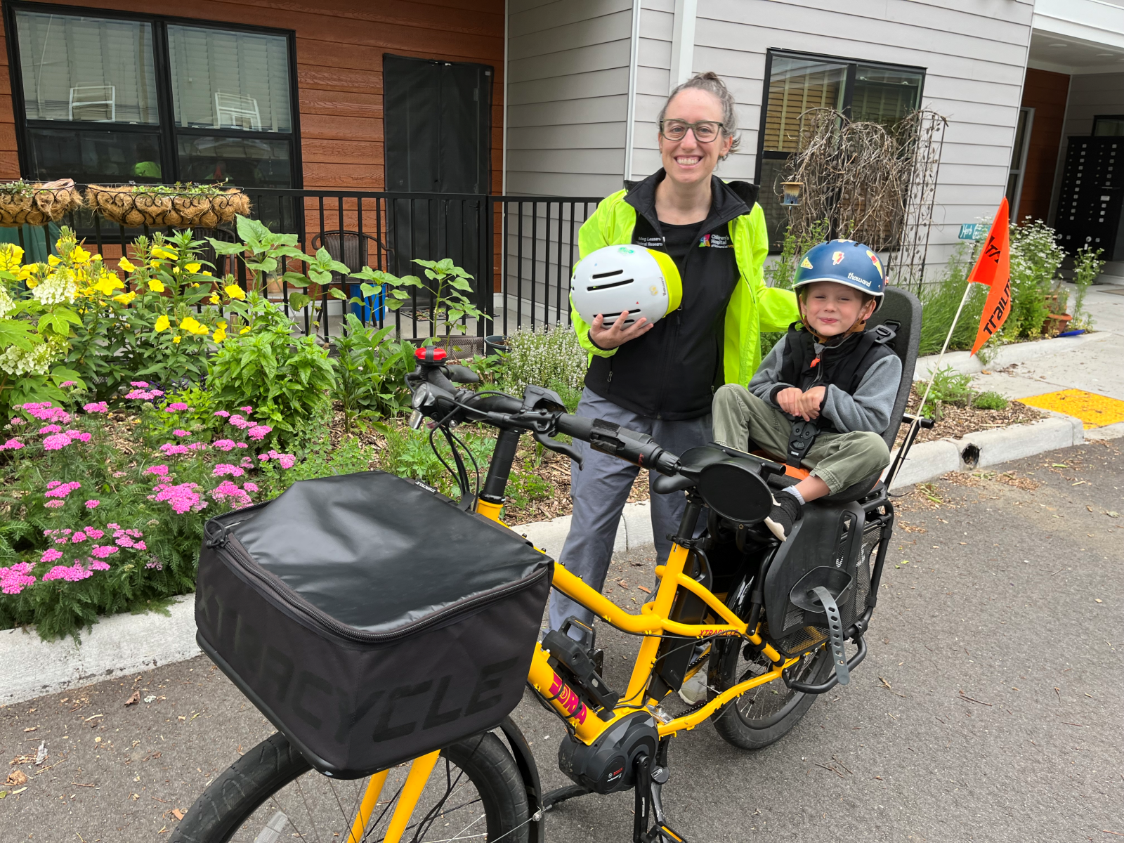 CHoR researcher Meg Lessard and her son on their bike
