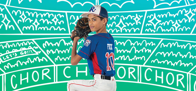 A teen playing baseball