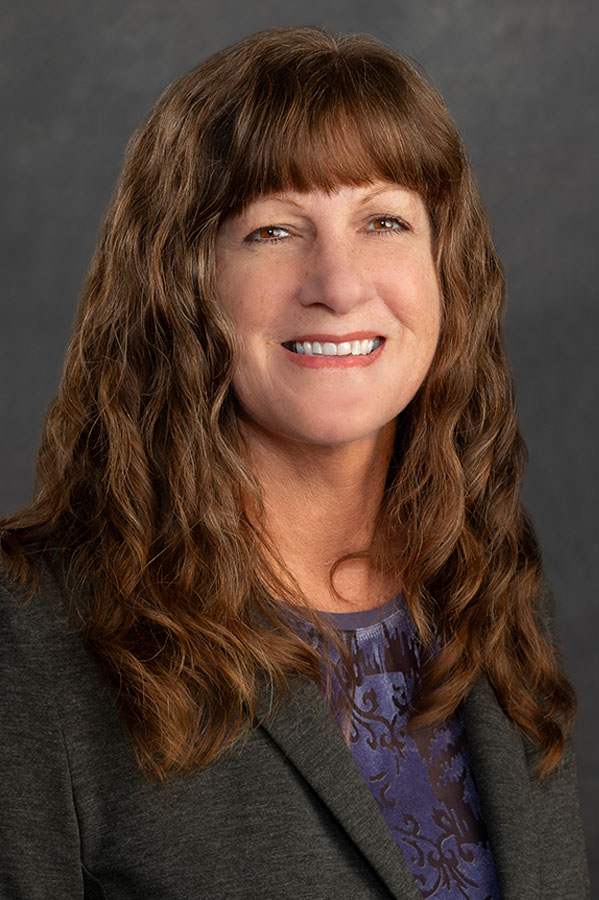 Headshot of Melinda Lambert smiling